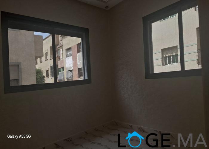 Appartement de deux façades, de 86 m2 près central laitières jadida .