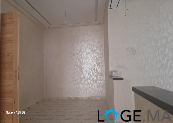 Appartement de deux façades, de 86 m2 près central laitières jadida .