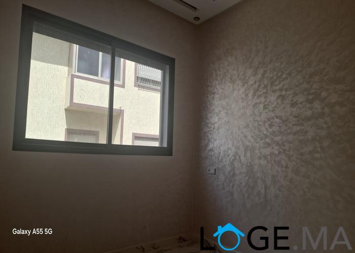 Appartement de deux façades, de 86 m2 près central laitières jadida .