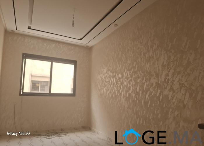 Appartement de deux façades, de 86 m2 près central laitières jadida .