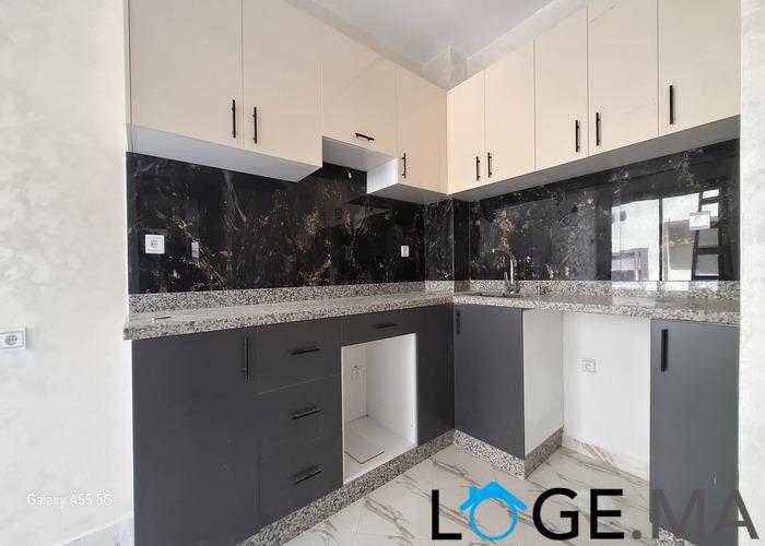 Appartement de deux façades, de 86 m2 près central laitières jadida .