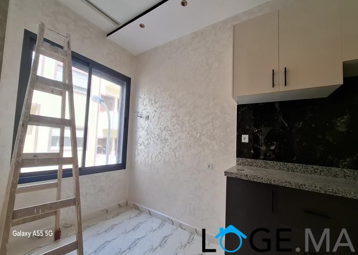 Appartement de deux façades, de 86 m2 près central laitières jadida .