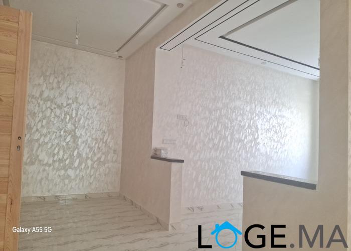 Appartement de deux façades, de 86 m2 près central laitières jadida .