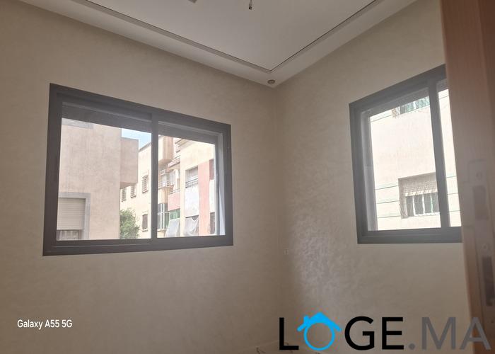 Appartement de deux façades, de 86 m2 près central laitières jadida .