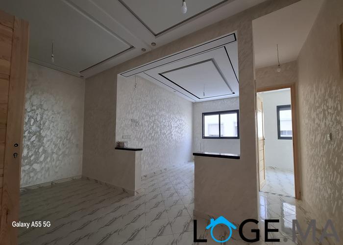 Appartement de deux façades, de 86 m2 près central laitières jadida .