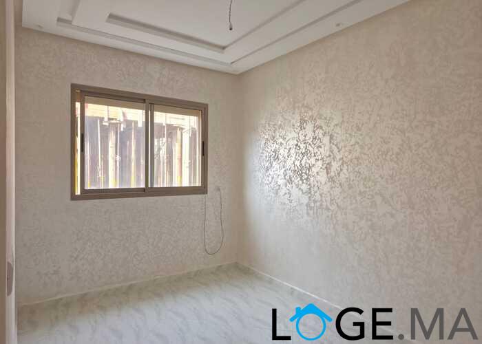 Appartement a vendre  de 82 m2 au 2ème étage de deux façades a Al bousstane el jadida.