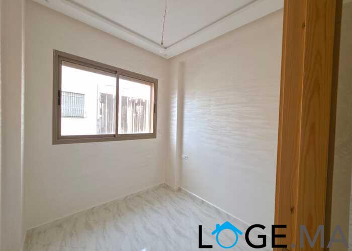 Appartement a vendre  de 82 m2 au 2ème étage de deux façades a Al bousstane el jadida.