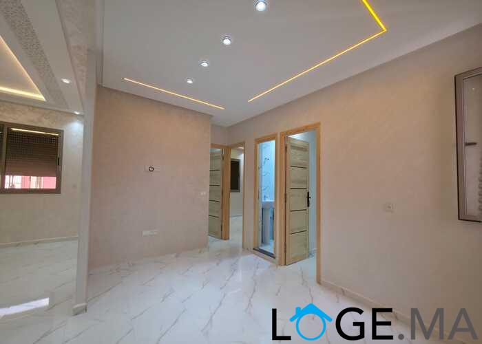 Appartement neuf a vendre avec escalier privatif étage courant a el jadida .