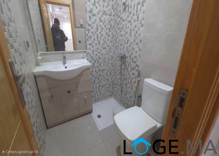 Appartement a vendre dans une immeuble en 4ème étage de deux façades a el jadida.