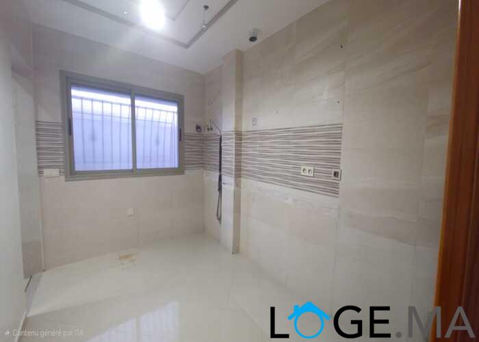 Appartement a vendre dans une immeuble en 4ème étage de deux façades a el jadida.