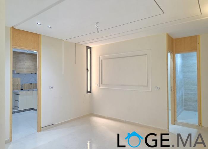 Appartement a vendre dans R+2 ,de 113 m2 escalier privatif a el jadida. 