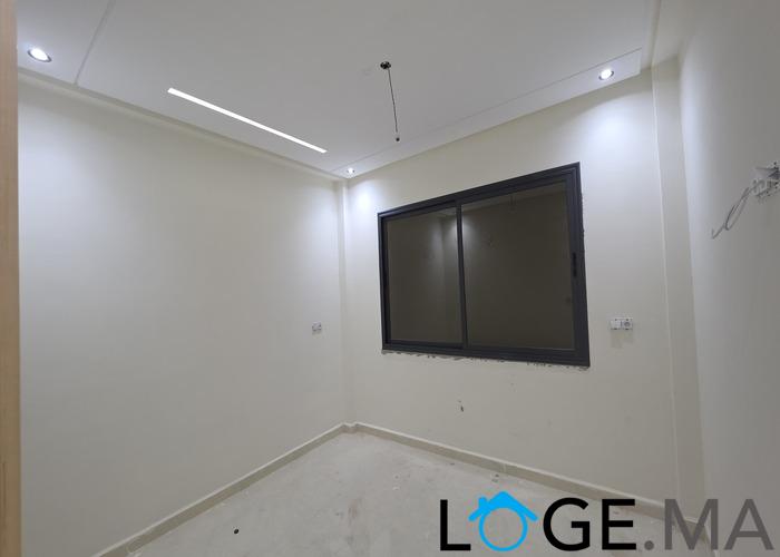 Appartement a vendre dans R+2 ,de 113 m2 escalier privatif a el jadida. 