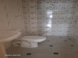 Appartement de deux façades, de 86 m2 près central laitières jadida .