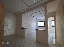 Appartement de deux façades, de 86 m2 près central laitières jadida .