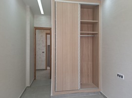 Appartement a vendre dans R+2 de 130 m2 de 2 façades escalier privatif a el jadida.
