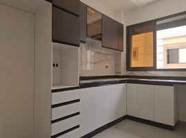 Appartement a vendre dans R+2 de 130 m2 de 2 façades escalier privatif a el jadida.