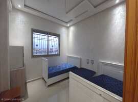 Appartement a vendre dans une immeuble en 4ème étage de deux façades a el jadida.