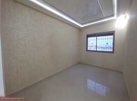 Appartement a vendre dans une immeuble en 4ème étage de deux façades a el jadida.