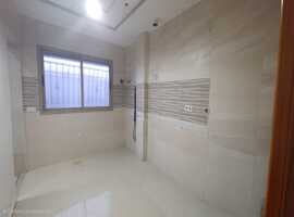 Appartement a vendre dans une immeuble en 4ème étage de deux façades a el jadida.