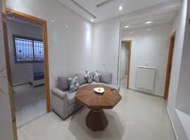 Appartement a vendre dans une immeuble en 4ème étage de deux façades a el jadida.